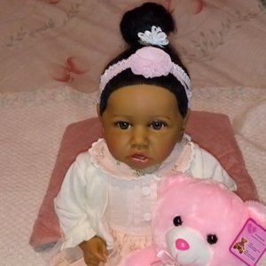 22" REALISTIC DOLL WIITH LIGHT-UP BEAR ALSO DOLL ACCESSORIES AND BABY BLANKET